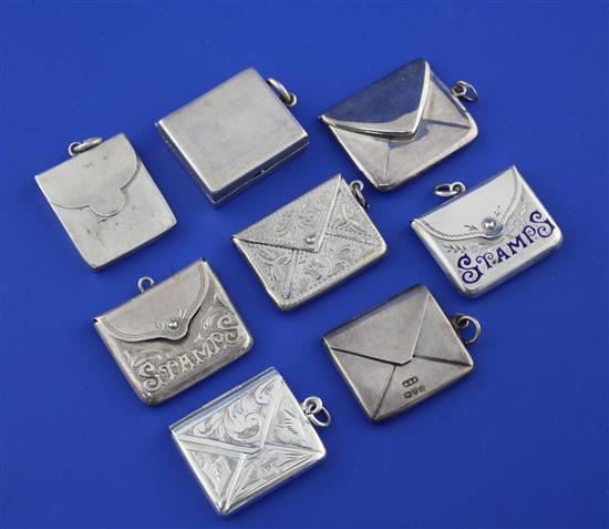 A collection of eight late Victorian and later silver stamp cases, 1.25in et infra.